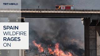 Spain battles one of its largest wildfires as evacuations continue