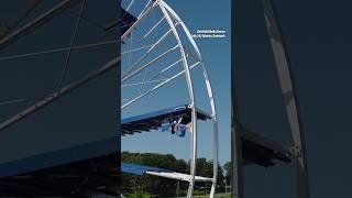Athlete completes obstacle course inside a 98.5-foot moving Ferris wheel