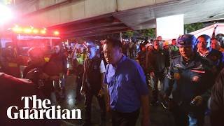 Thai prime minister visits site of Bangkok pub fire that killed at least 27 people