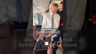 Slovakia president displays revolver gifted by Erdogan at NATO summit