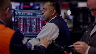 US stocks end higher; chip surge offsets Iran worries