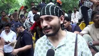Delhi police fire tear gas, thousands protest Modi government