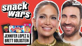 Jennifer Lopez & Brett Goldstein Try UK vs US Food | Snack Wars