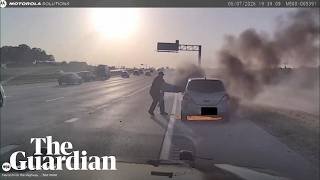 Footage shows Texas police officer rescuing man from burning car