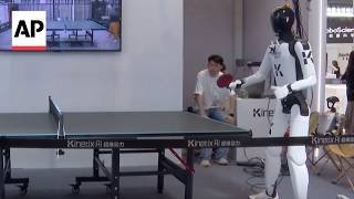 Humanoid robots dance, play table tennis and do laundry at WAIC 2026