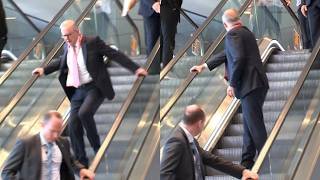 Albanese narrowly avoids fall after escalator abruptly stops