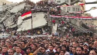Egypt fans in Gaza gather amid rubble to cheer against Argentina