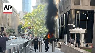 Ex-soldier starts a fire and fires pellet gun outside New York federal building, FBI says