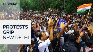 Thousands protest in New Delhi over exam leak scandal
