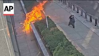 Surveillance video shows fireworks and flames lit on New York federal building