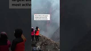 Mount Etna lava pour into neighboring summit crater