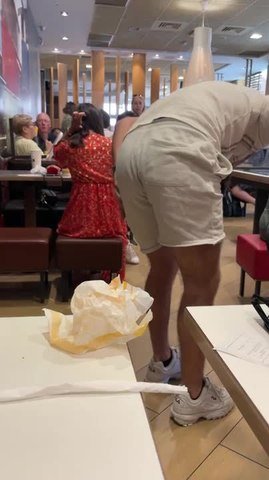 Man Leans Too Far and Takes Dramatic Tumble During Restaurant Dinner