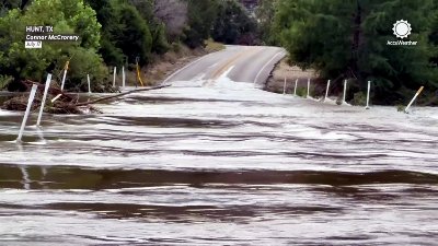 Flooded roadway cuts through area near Hunt, Texas