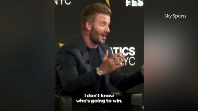 David Beckham looks uncomfortable as he's booed over World Cup comments
