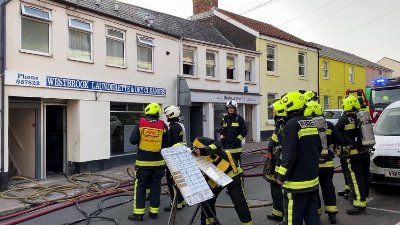 Fire crews have been called to a launderette in Kingsbridge.